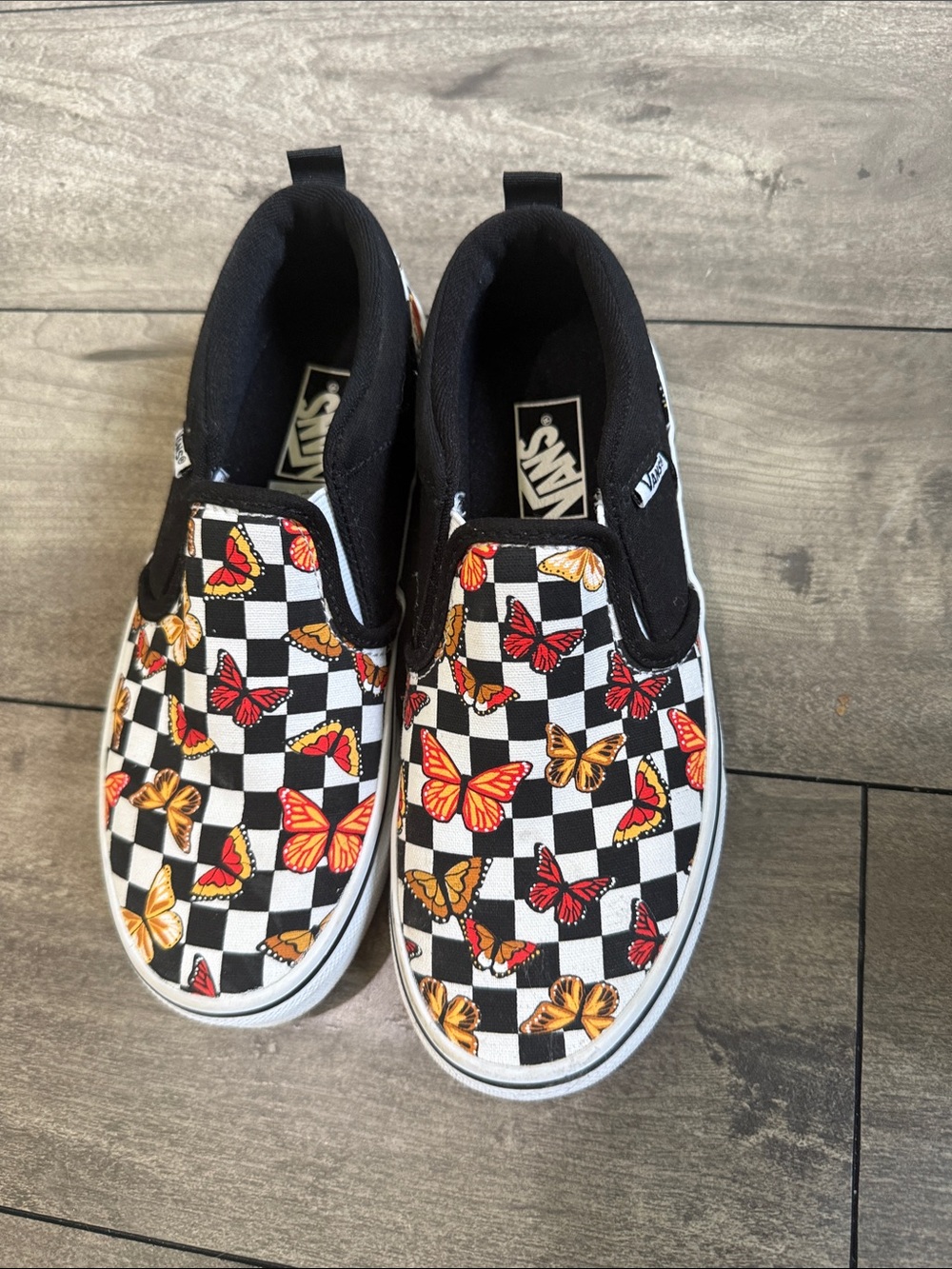 Vans Kids Slip-On Shoes - Black Checkerboard with Orange & Red Butterflies